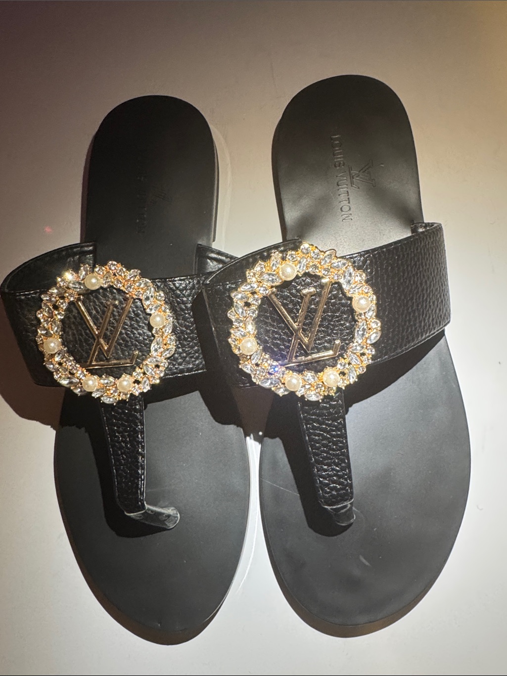 Black Embellished Toe-Post Sandals With Logo Medallion